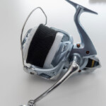 Fixed Spool Reel Line Retaining Band fitted